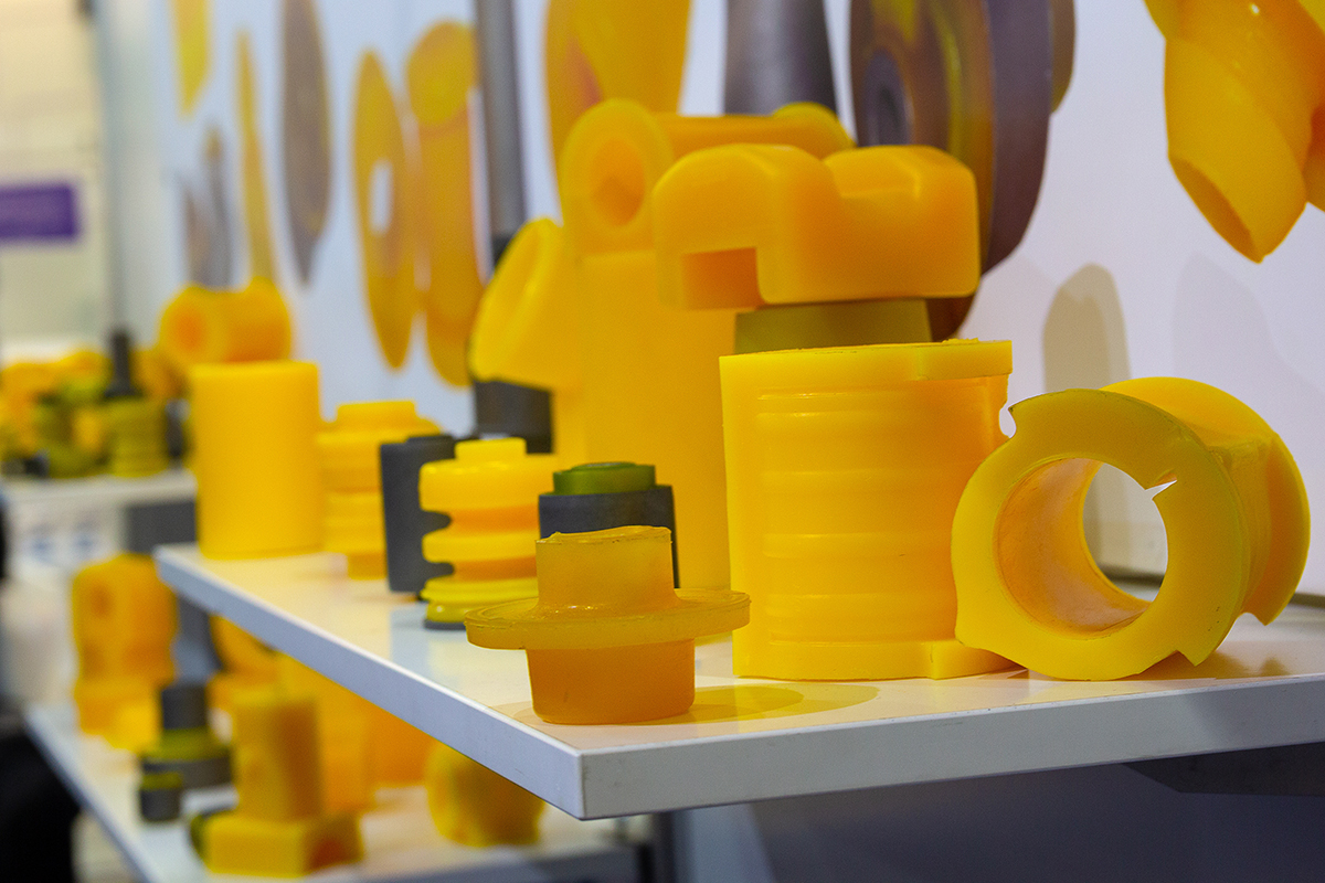 Bright yellow polyurethane parts and pieces on display