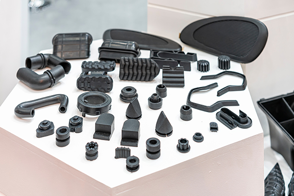protects-surfaces Various rubber molded parts for automotive engines arranged in a display