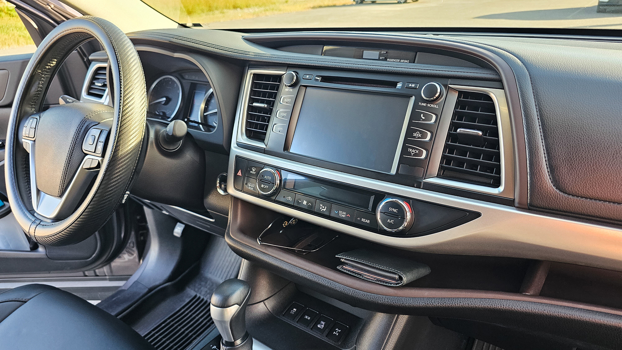 The interior of a car featuring the car’s dashboard.
