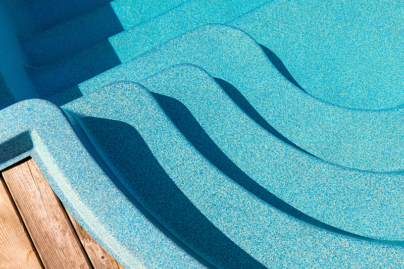 the stairs of a compression-molded pool