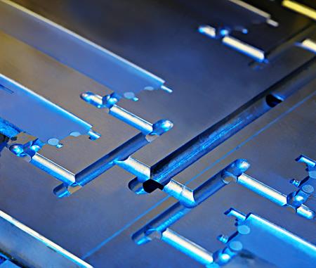 A close-up of an injection mold’s sprues and runners.